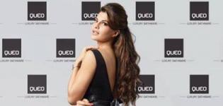 Jacqueline Fernandez in Black One Piece Dress - Announced as Brand Ambassador of QUEO by Hindware