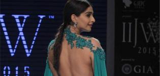 Sonam Kapoor in Green Backless Dress Photos at India International Jewellery Show 2015