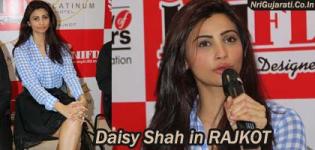 Daisy Shah at INIFD Rajkot New Building Inauguration in Knee Length Black Skirt n Checkered Shirt