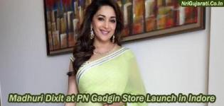 Madhuri Dixit in Light Lemon Colour Saree Photos at PN Gadgil Jewellery Store Launch in Indore India